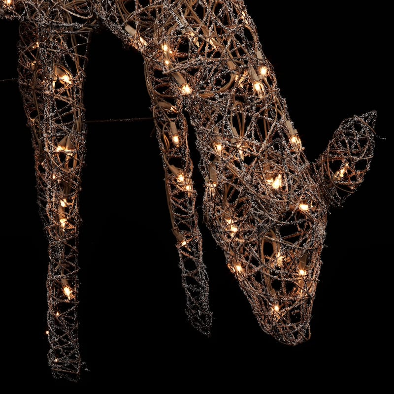 Alpine Corporation Outdoor Rattan Grazing Christmas Reindeer Lawn Decoration with White Halogen Lights