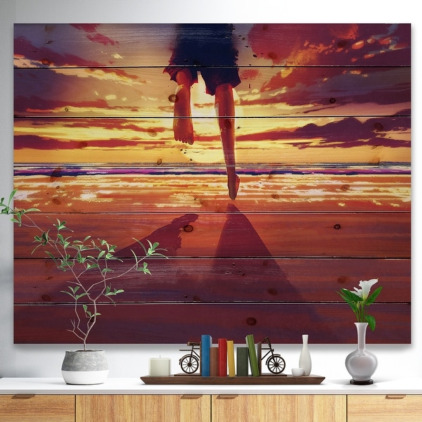 Designart 'Man feet running in Sunset' People Sea & Shore Print on Natural Pine Wood - Pink. Opens flyout.