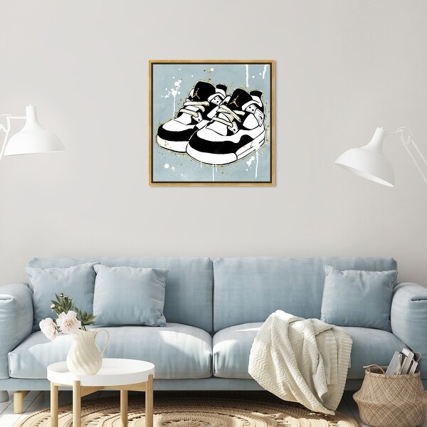 Oliver Gal 'Baby Sneakers' Fashion and Glam Wall Art Framed Canvas
