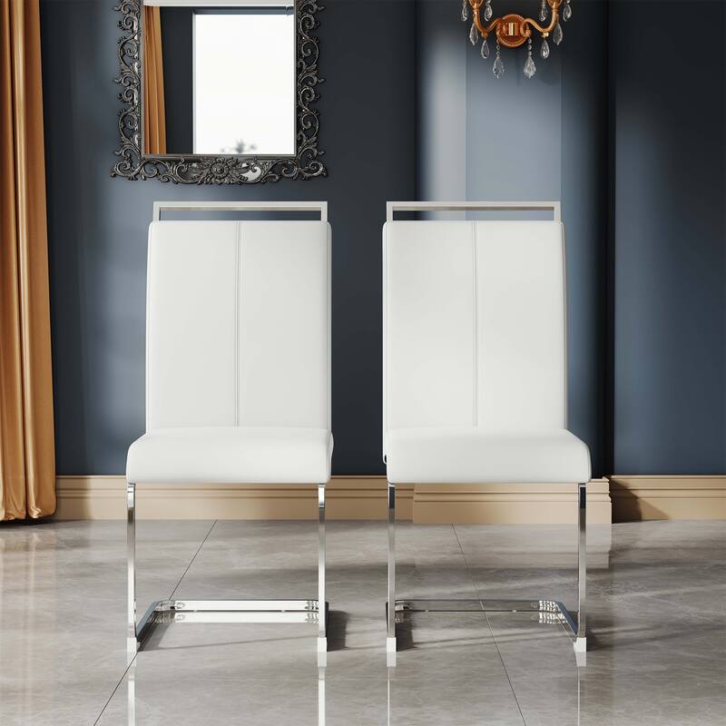 A set of 4 artificial leather dining chairs