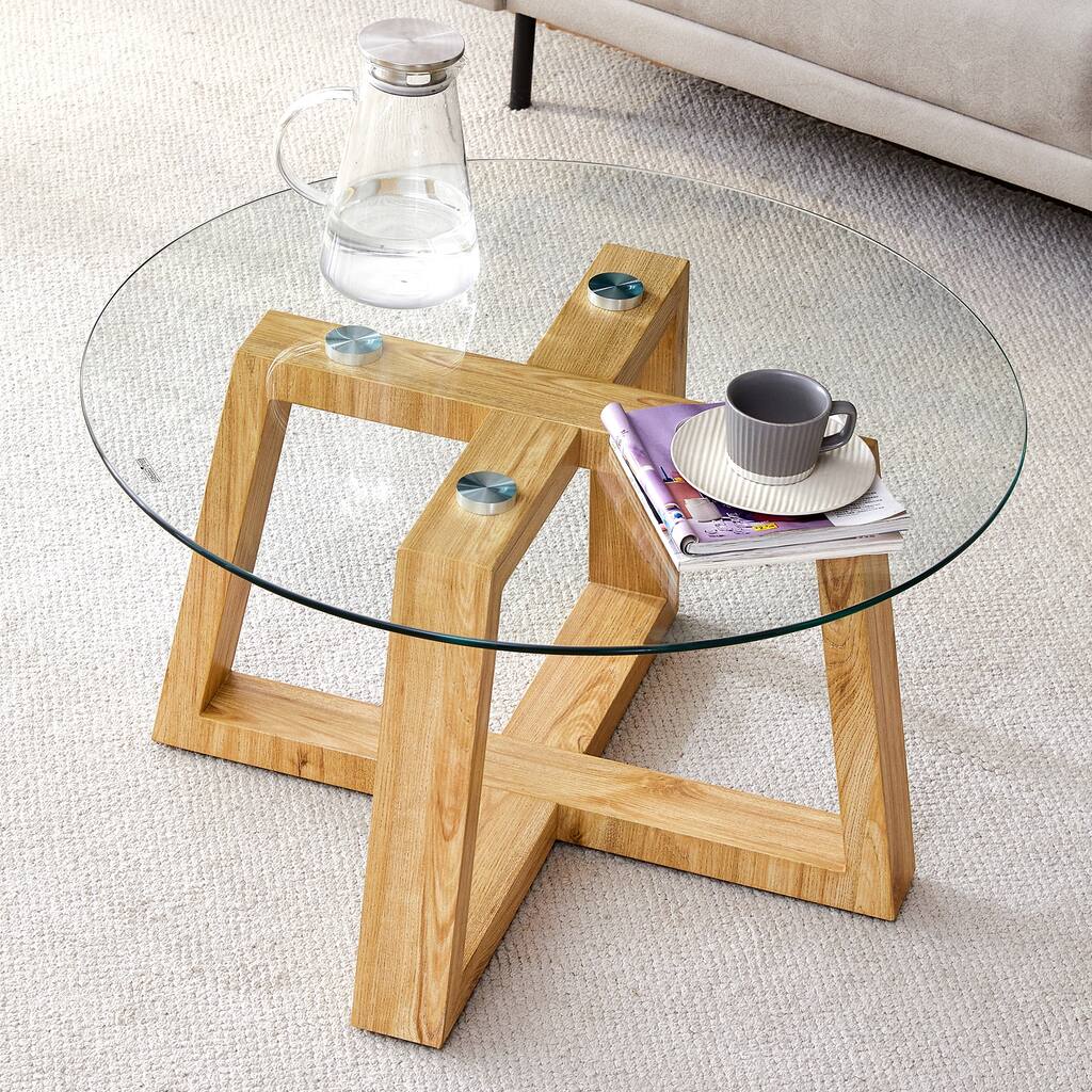 Modern practical circular coffee tables. Made of transparent tempered glass tabletop and wood colored MDF material