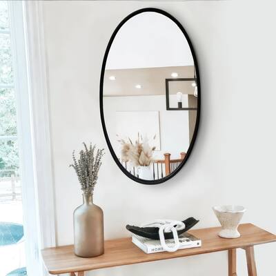 Oval Metal Wall Mirror with Framed Edges and Wooden Backing, Black