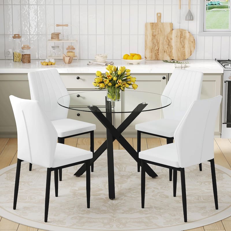 Table and chair set.Modern glass round table: X-shaped black metal bracket. Paired with 4 Dining Chairs