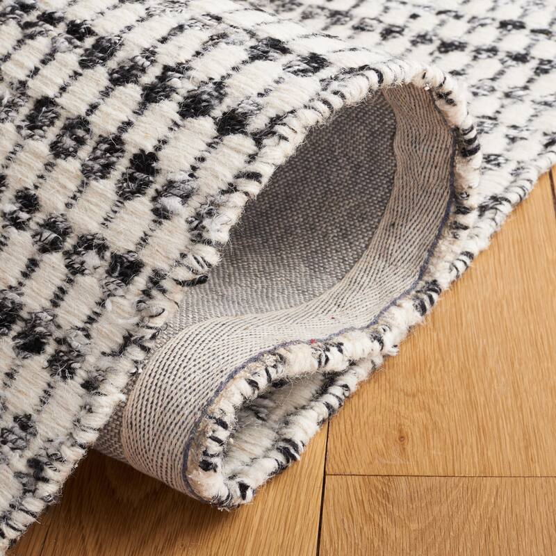 SAFAVIEH Handmade Casablanca Shag Ritsuko Wool Tassel Rug