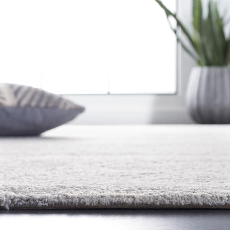 SAFAVIEH Handmade Outdoor Florência Micro-Loop Rug - 6' x 9' - Ivory