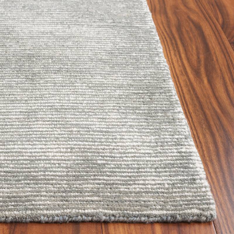 SAFAVIEH Handmade Ebony Sora Wool Rug