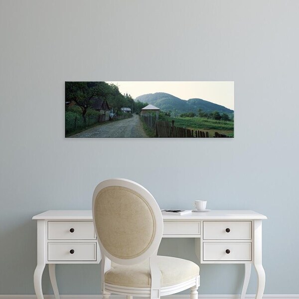 Easy Art Prints Panoramic Images's 'Dirt road leading towards a village, Transylvania, Romania' Premium Canvas Art