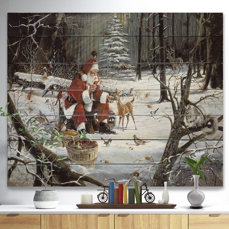 Designart 'Santa Claus with deer in snowy woods' Print on Natural Pine Wood - White