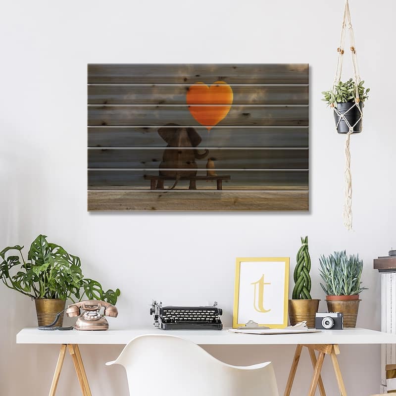Elephant And Dog Holding A Heart Shaped Balloon Print On Wood by Mike Kiev - Multi-Color