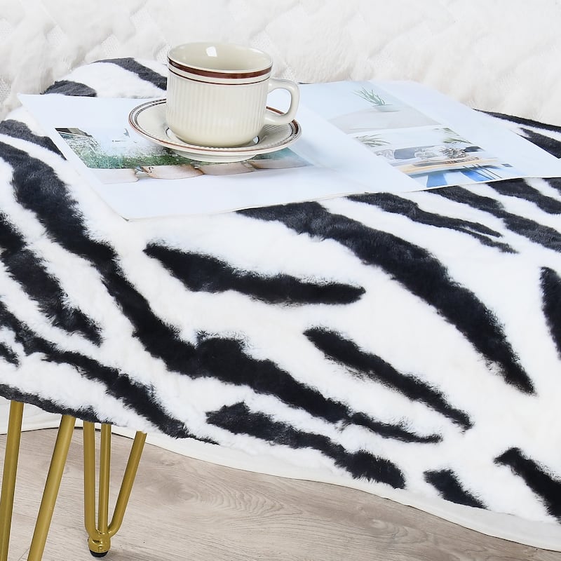Home Soft Things Zebra Fauxfur Ottoman with Gold Metal Legs.