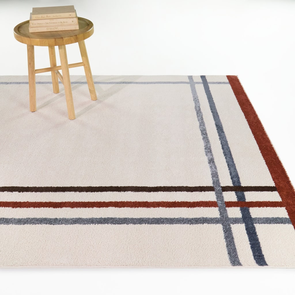 Mosley Striped Border Area Rug
