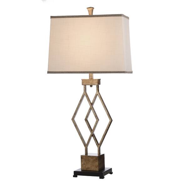 Stylecraft Vintage Gold Table Lamp White Hardback Fabric Shade Overstock 20953665 It is mounted atop an adjustable arm placed in a reeded column base. overstock com