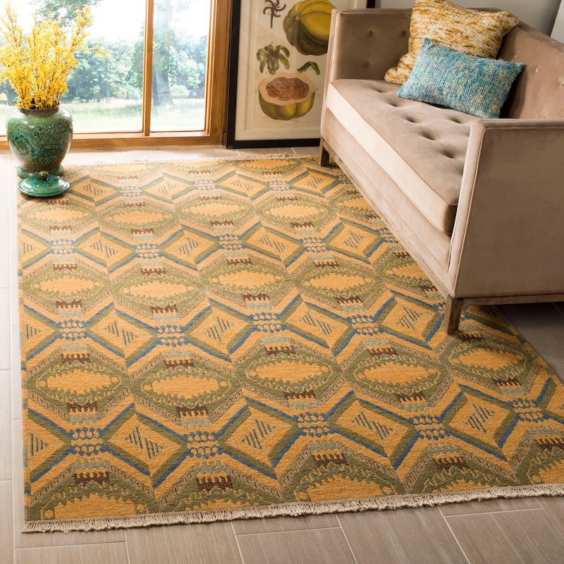 SAFAVIEH Couture Hand-knotted Pascale Modern Wool Rug - 6' x 9' - Saffron Yellow
