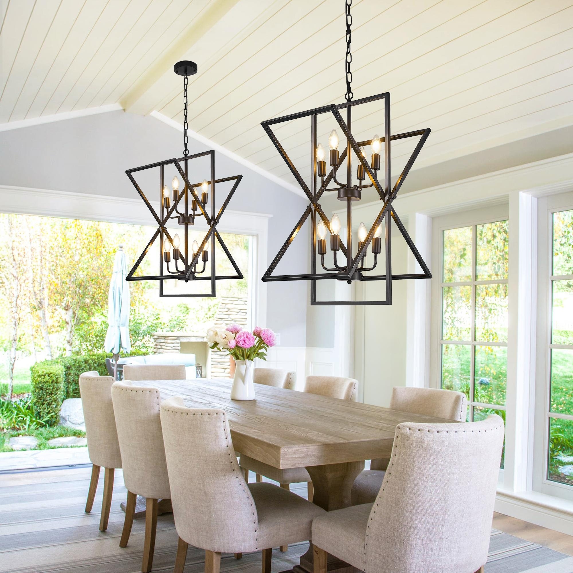 Dining room with two chandeliers cheap