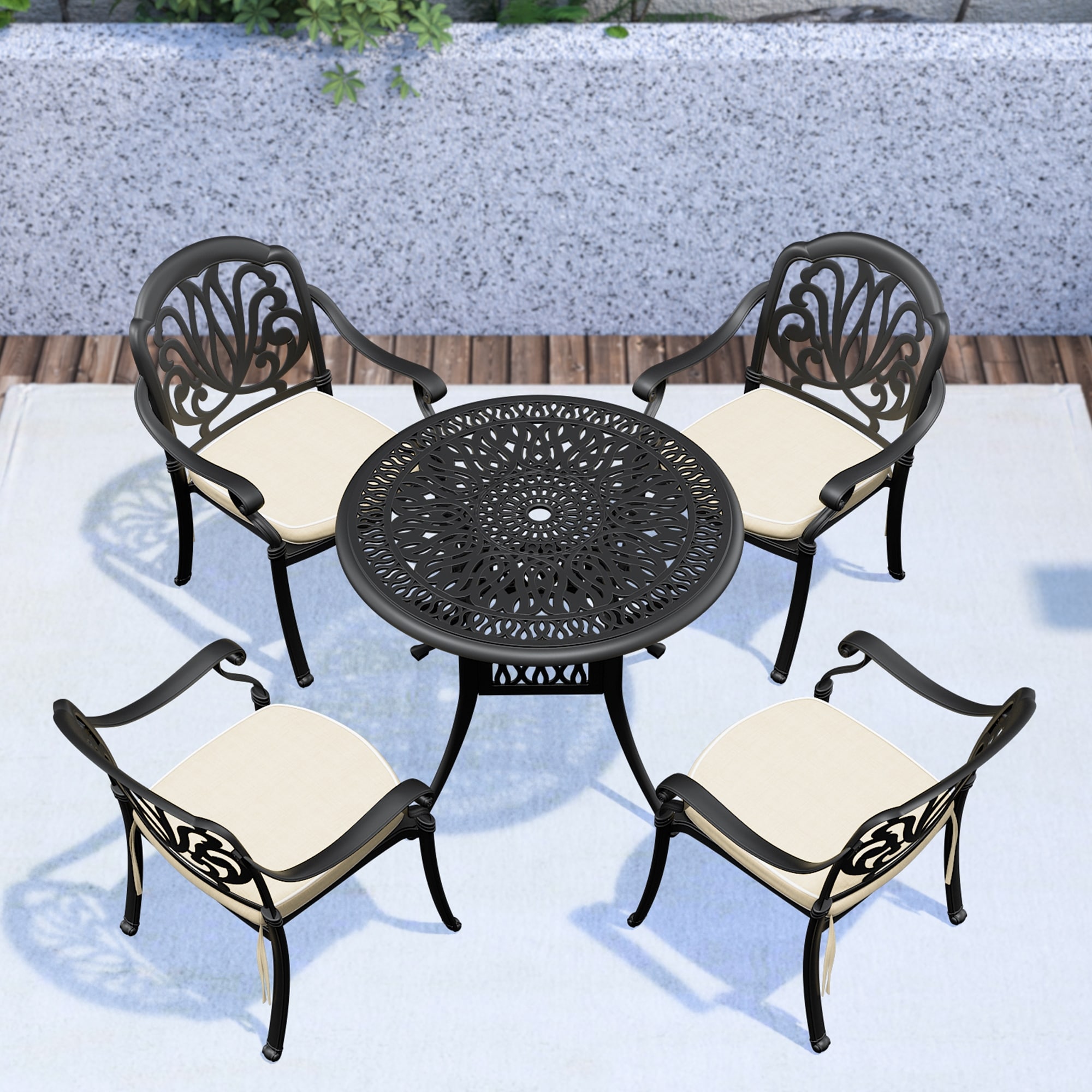 Black cast iron table and chairs sales