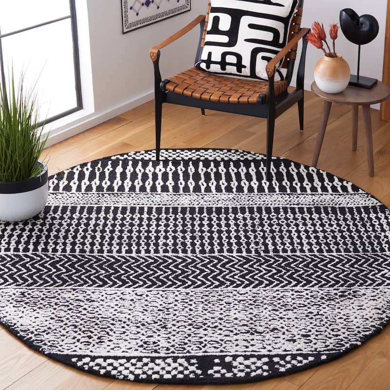 SAFAVIEH Handmade Glamour Shag Modern Viscose Rug - 6' Round - Black/Ivory