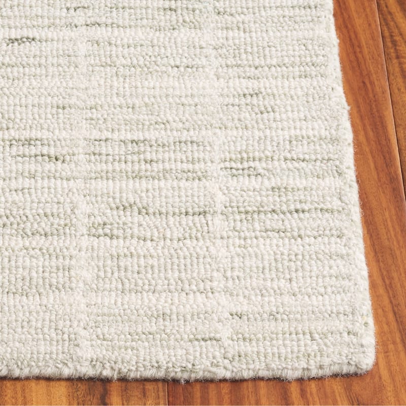 SAFAVIEH Handmade Ebony Peigi Contemporary Wool Rug