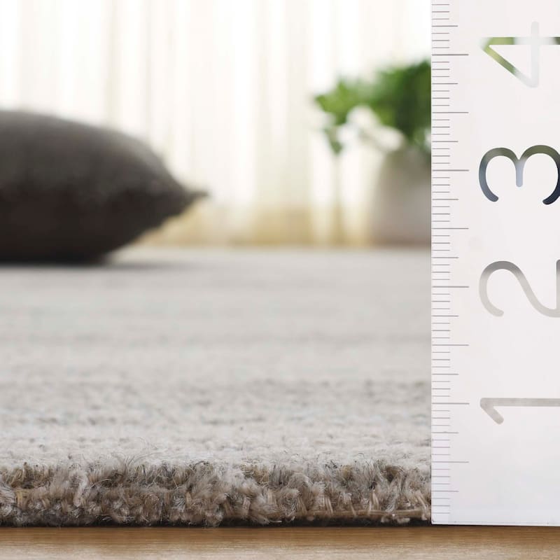 SAFAVIEH Handmade Ebony Mahnaz Modern Striped Wool Rug