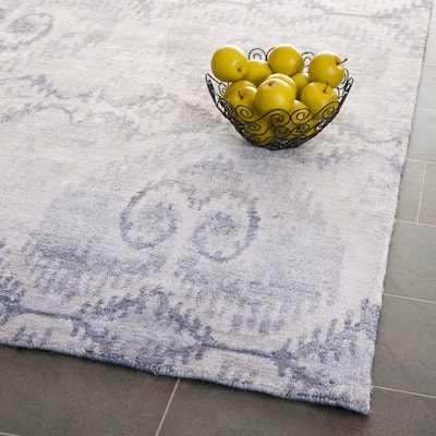 SAFAVIEH Couture Hand-knotted Tibetan Speranta Modern Wool Rug