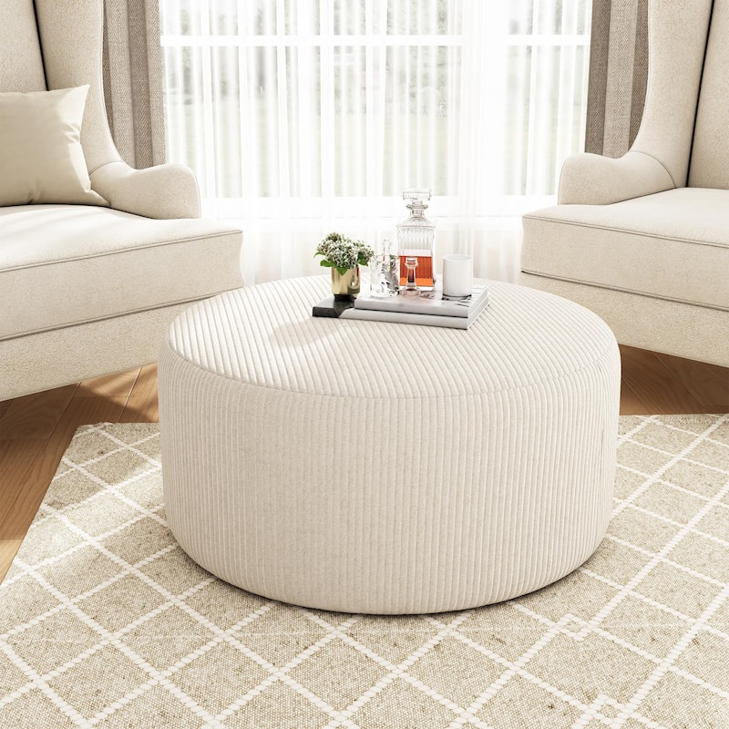 Upholstered round footstool
