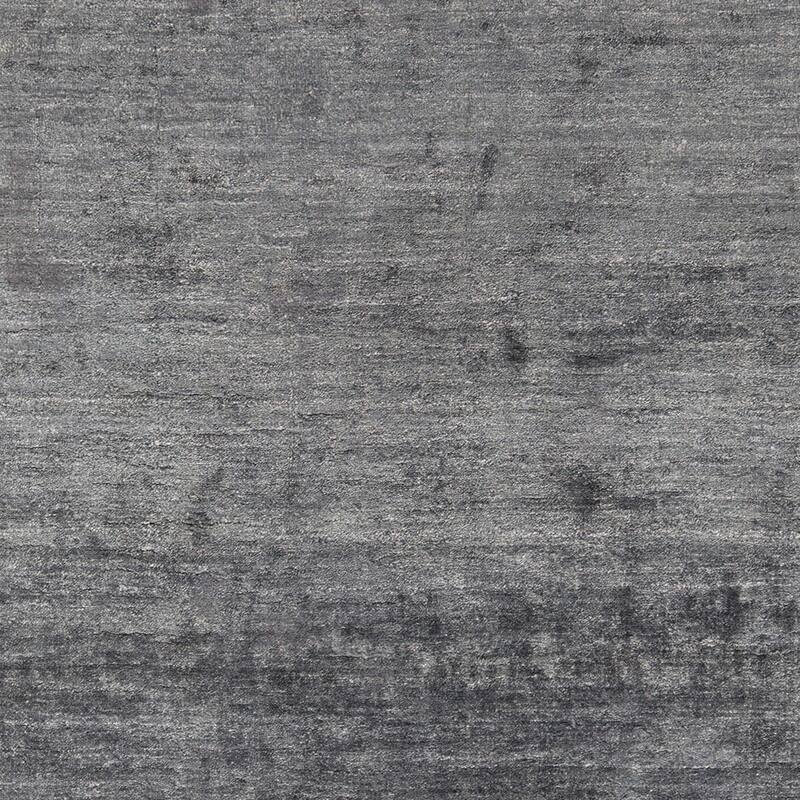 Hand-woven Dan Solid Viscose Area Rug