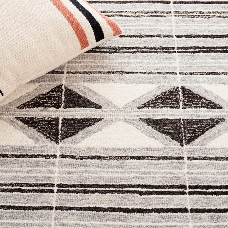 SAFAVIEH Handmade Ebony Houkje Modern Wool Rug