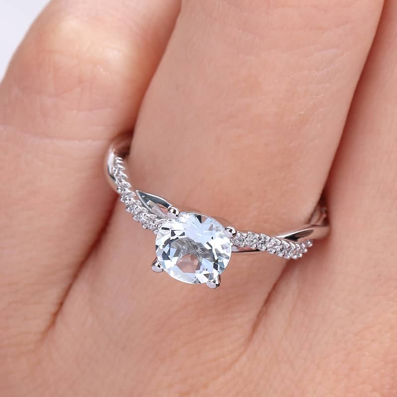 Miadora Aquamarine and 1/6ct TDW Diamond Crossover Birthstone Ring in 14k White Gold