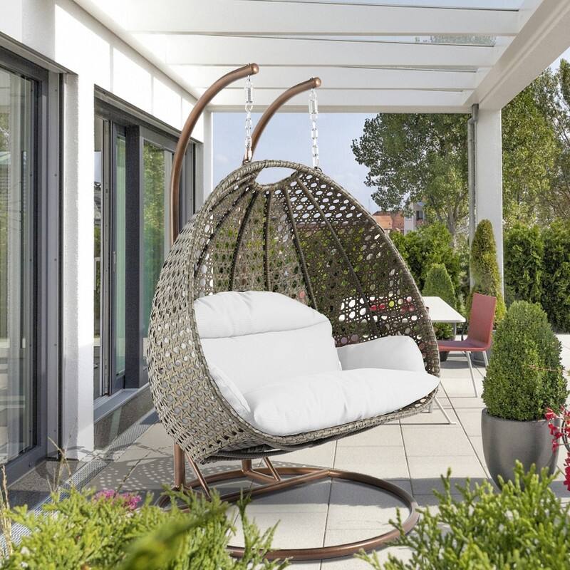 LeisureMod Modern 2-Person Egg Hanging Swing Chair with Beige Wicker, Oxford Fabric Cover, Patio Hammock Lounger and Cushions