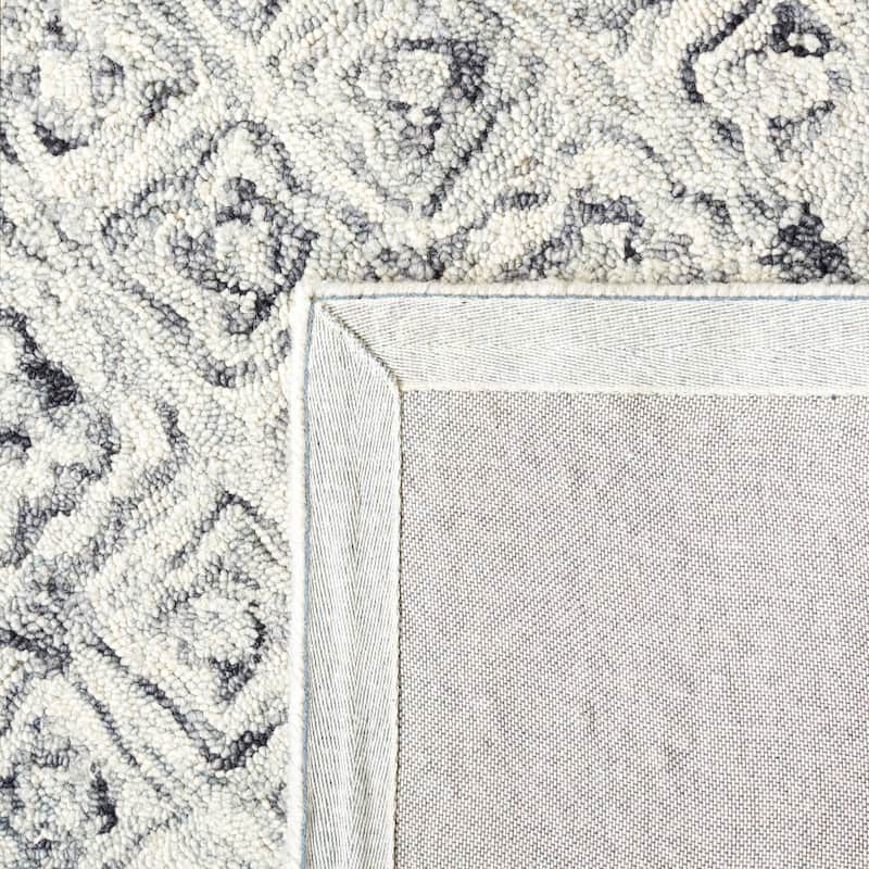 SAFAVIEH Handmade Micro-Loop Laszlone Wool Rug