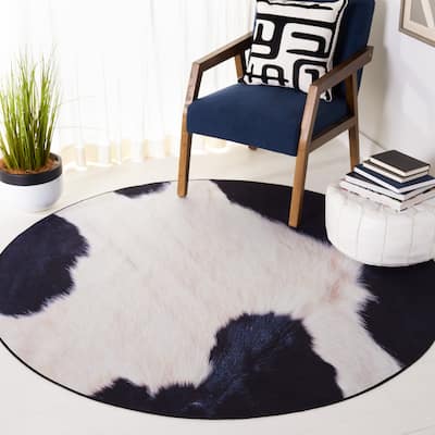 SAFAVIEH Faux Hide Machine Washable Slip Resistant Daphna Rustic Cow Print Rug