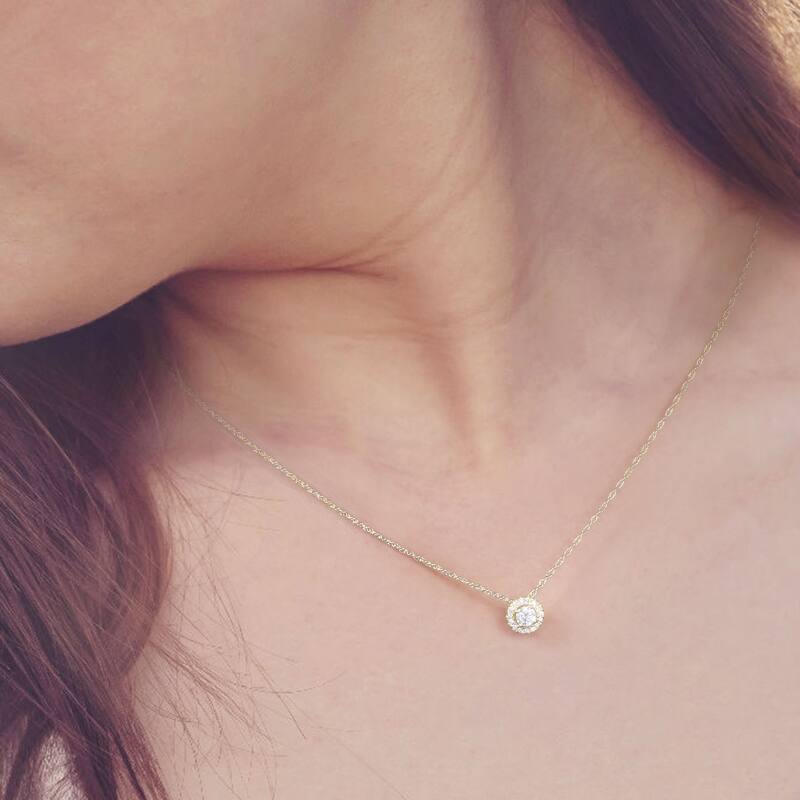 1/6ct TDW Diamond Solitaire Halo Pendant Necklace in 10k Gold for Women