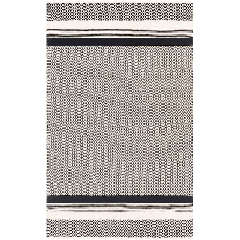 Artistic Weavers Dand Handmade Striped Cotton Area Rug On Sale Bed