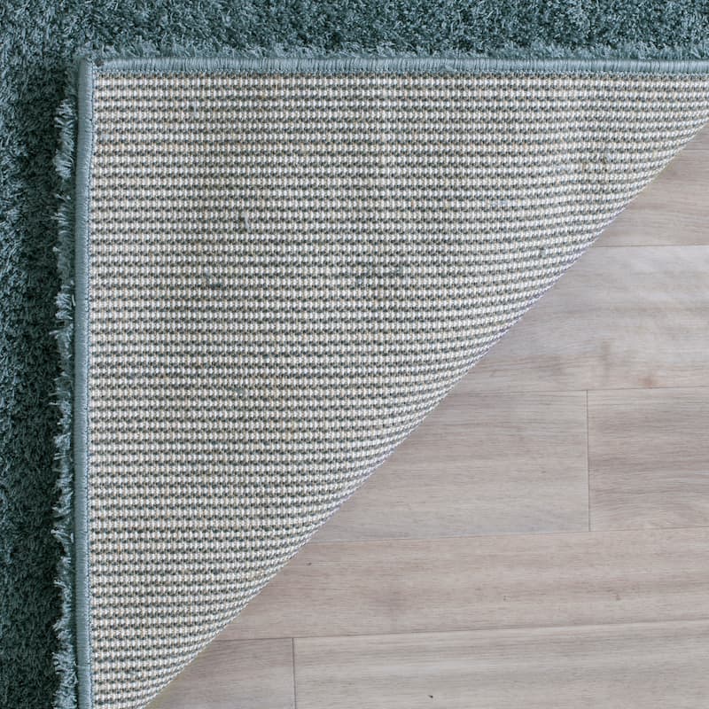 SAFAVIEH Velvet Shag Eusebia Solid Polyester Rug