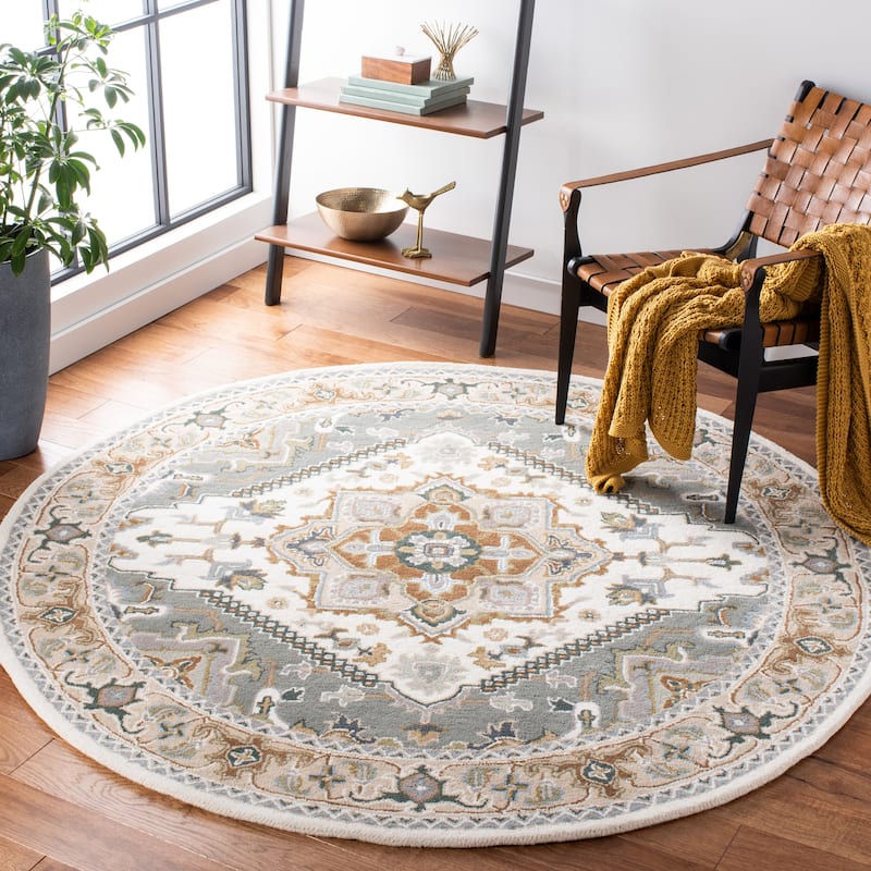 SAFAVIEH Handmade Heritage Carrol Traditional Oriental Wool Rug - 4' x 6' Oval - Ivory/Light Blue - Rectangle