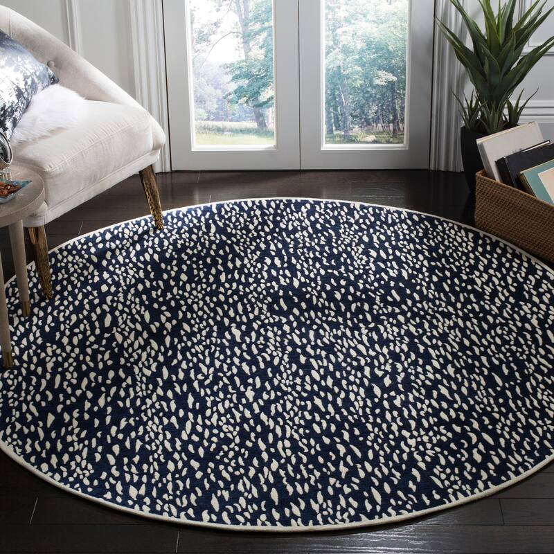 SAFAVIEH Handmade Marbella Goril Modern Polyester Rug - 6' Round - Navy Blue/Ivory