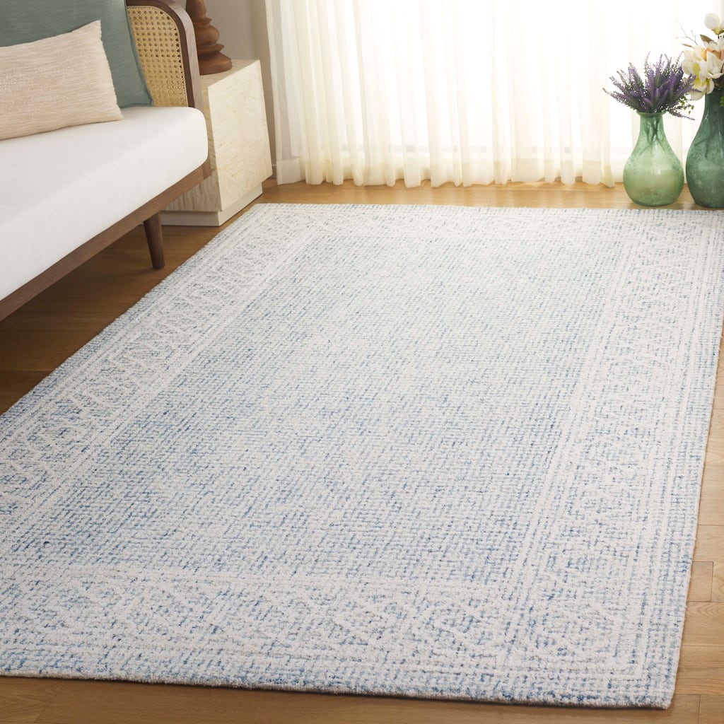 SAFAVIEH Handmade Ebony Lutien Wool Rug