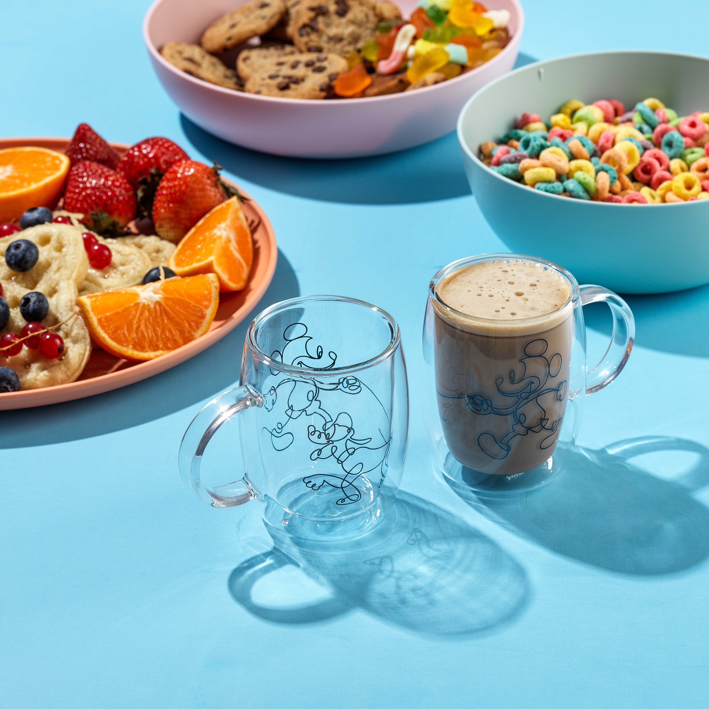 https://ak1.ostkcdn.com/images/products/is/images/direct/b10c3062a452c6ed570a8ce6a01c656646d8f741/JoyJolt-Disney-Mickey-and-Pluto-Glass-Mugs---Set-of-2-Double-Wall-Tea-Glass-Espresso-Coffee-Cups---5.4-oz.jpg