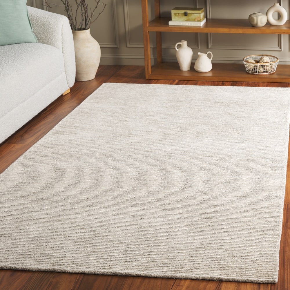 SAFAVIEH Handmade Ebony Sora Wool Rug