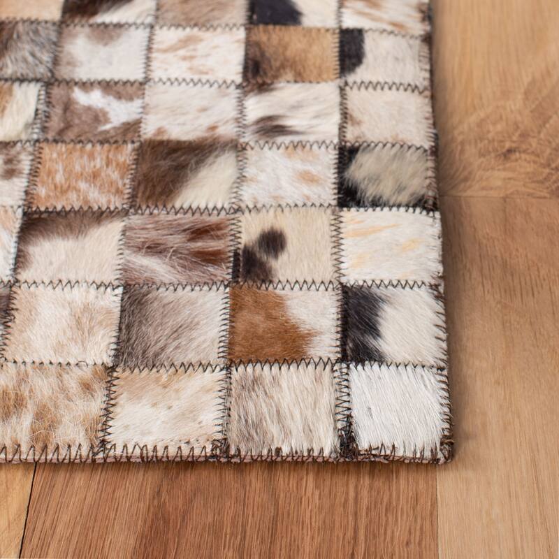 SAFAVIEH Handmade Studio Leather Tamisha Natural Hide Leather Rug