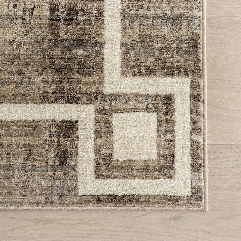 Olvera Geometric Bordered Area Rug