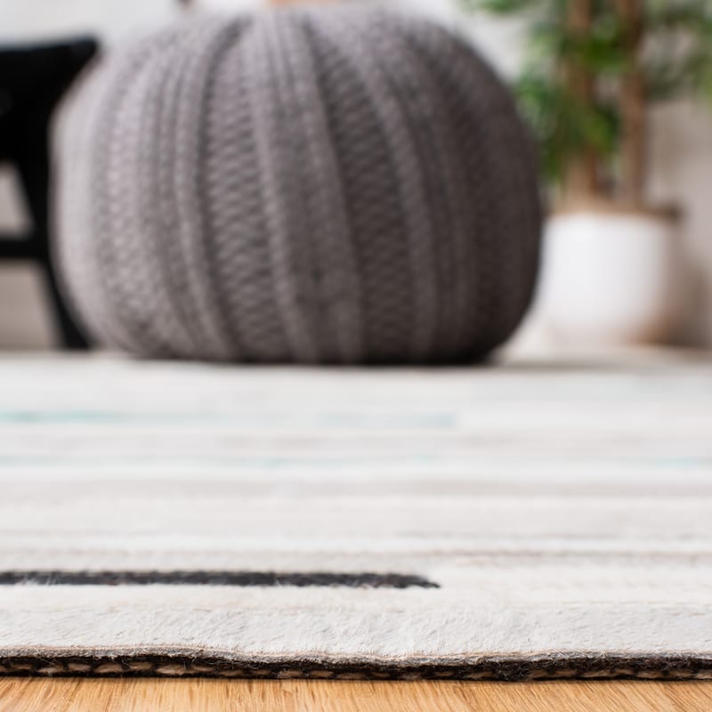SAFAVIEH Handmade Studio Leather Borghild Modern Leather Rug