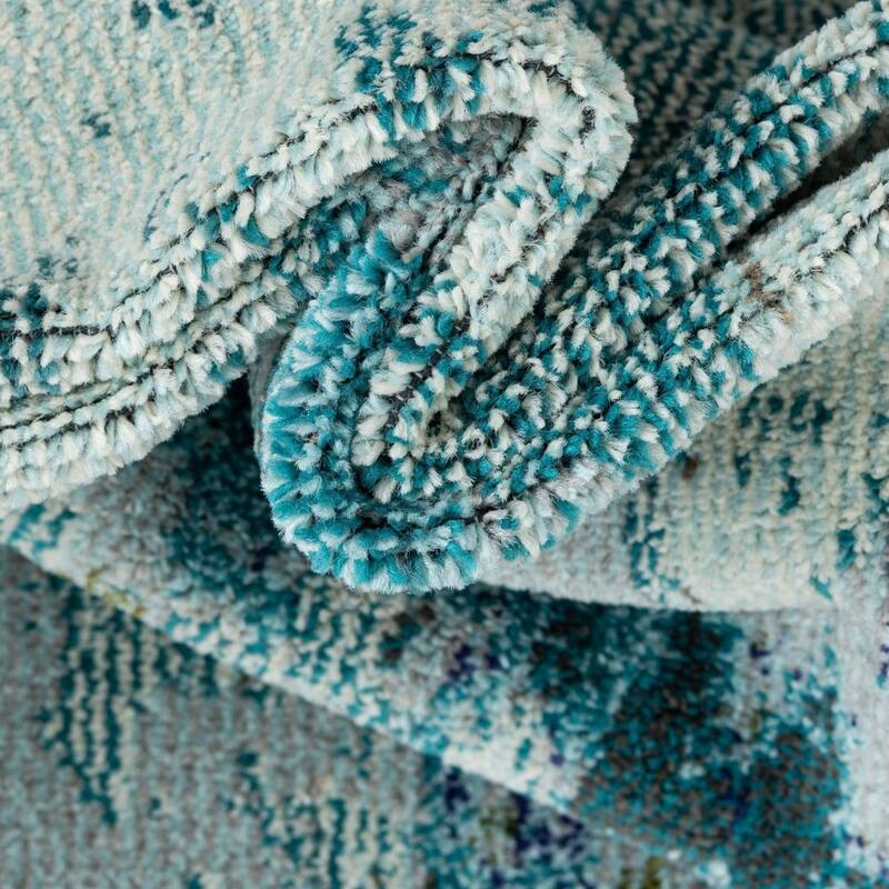 Novelty Cruxoit Collection Area Rug