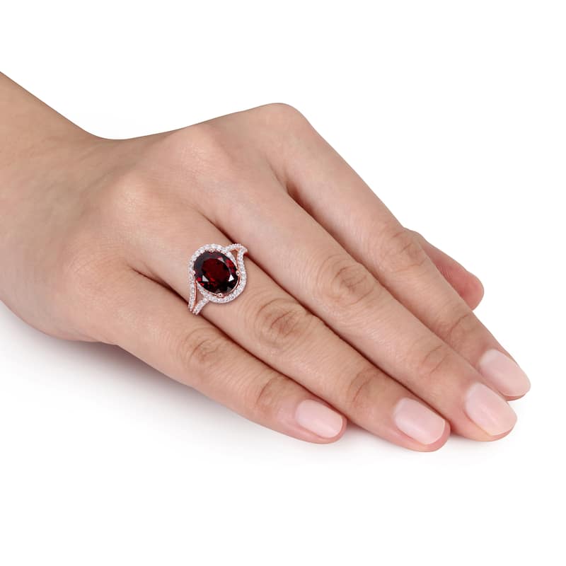 Miadora 3 1/2ct TGW Oval-Shaped Garnet 1/2ct TW Diamond Twist Halo Ring in 14k Rose Gold