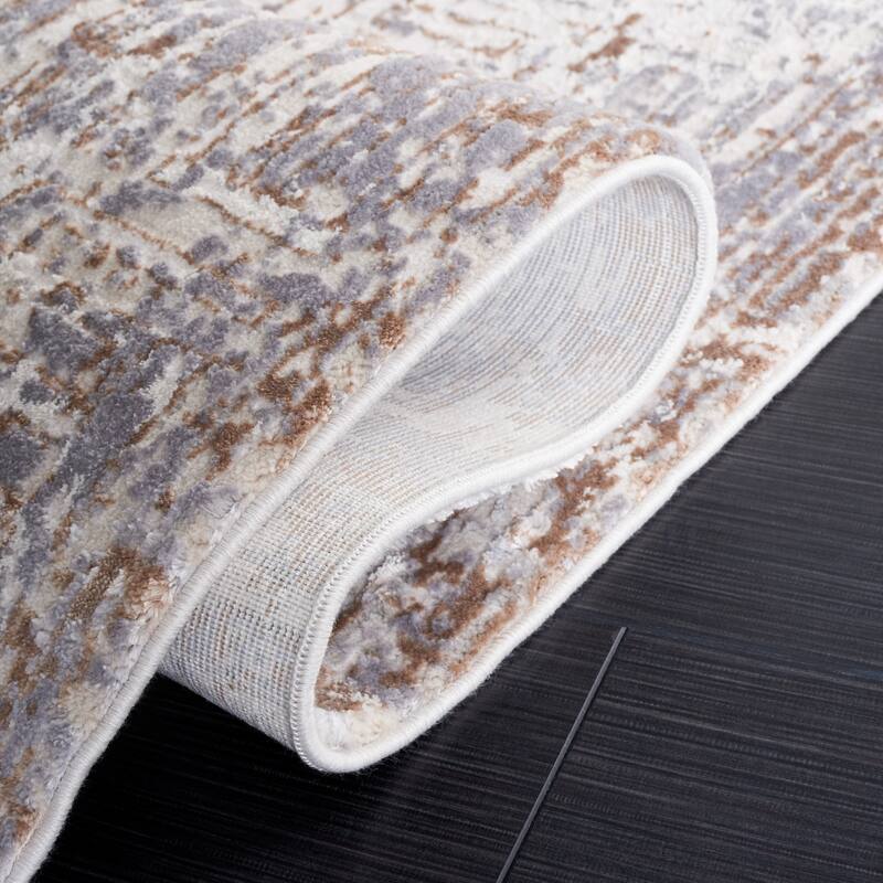 SAFAVIEH Diamond Bernarda Modern Abstract Fringe Rug