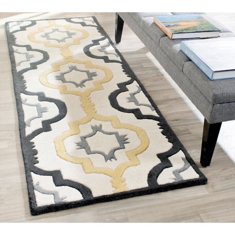 SAFAVIEH Handmade Chatham Vaka Modern Wool Rug - 2'3" x 11' Runner - Ivory/Multi