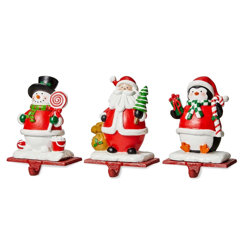 Glitzhome Resin Santa Snowman Penguin Gnomes with JOY Christmas Stocking Holders Mantel Ornament(Set of 3) - OLD041
