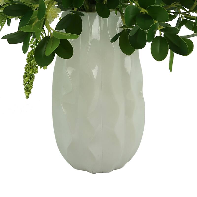 Budding Hydrangeas and Boxwoods Arranged in a Ceramic Vase