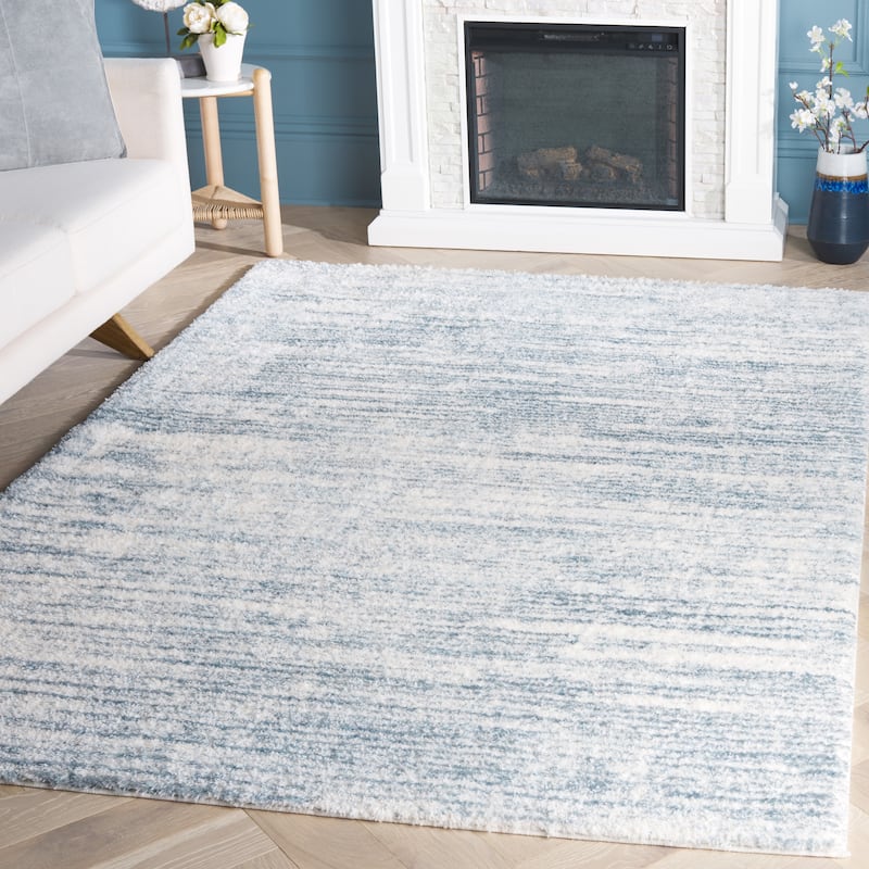 SAFAVIEH Tahoe Shag Yaprak Abstract 1.2-inch Thick Rug - 6'7" x 8'7" - Blue/Ivory - Rectangle