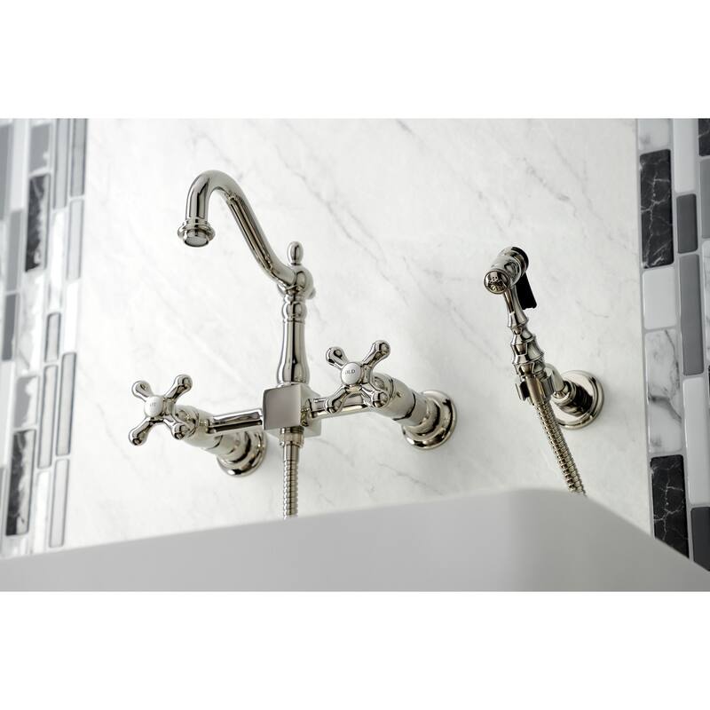 Kingston Brass Heritage Wall Mount Bridge Kitchen Faucet with Brass Sprayer - Polished Nickel