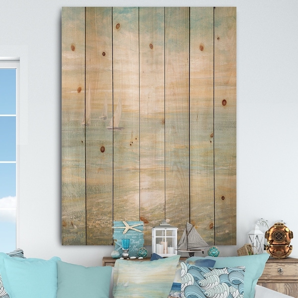 Designart 'Sunrise Boat I' Nautical & Coastal Print on Natural Pine Wood - Blue. Opens flyout.